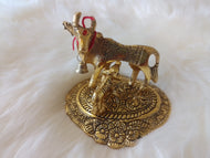 Gold Kamdhenu Cow and Calf Brass Like Metal Showpiece for Home Decor and Decorative Gift Item