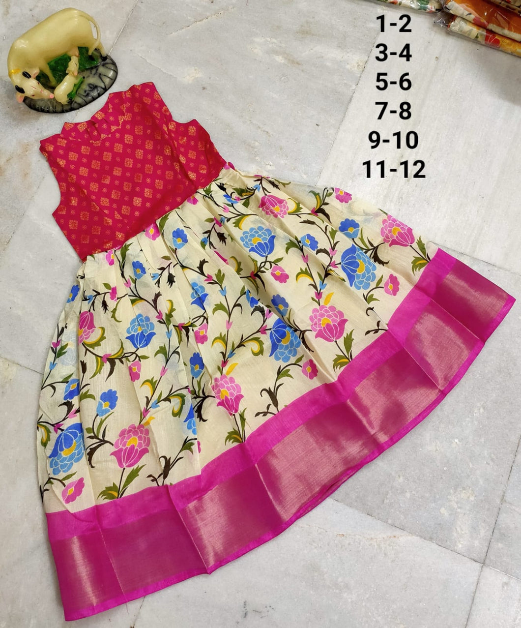 Soft linen silk with floral print & benarasi jacard combination collor neck frocks.